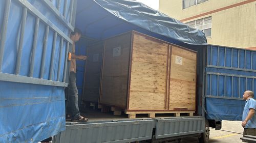 tin tức công ty mới nhất về 2 bộ máy đóng gói gấp găng tay PCL tùy chỉnh đang được chuyển đến khách hàng